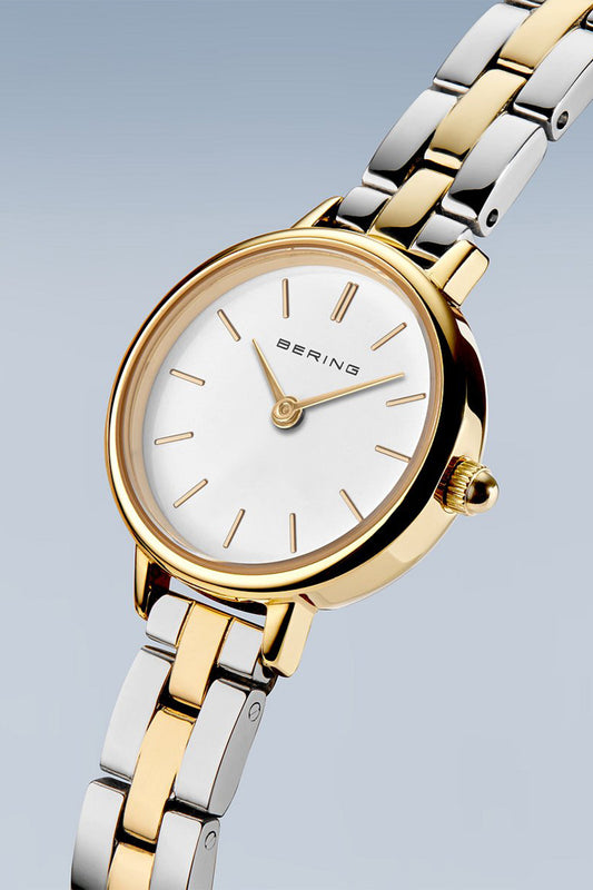 Bering Classic Ladies 26mm White Dial Two Tone Metal Strap Watch
