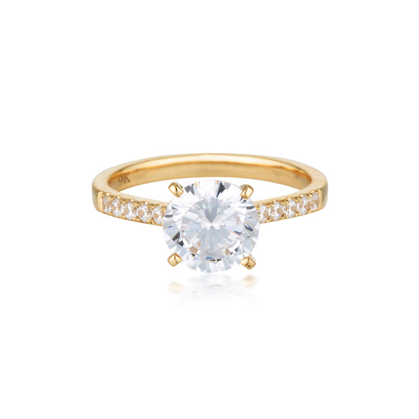 GEORGINI GOLD ROUND BRILLIANT CUT 2CT MOISSANITE ENGAGEMENT RING IN 9CT YELLOW GOLD